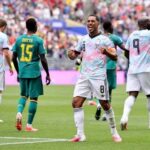 Belgium Fight Back from Two Goals Down to Eliminate Senegal